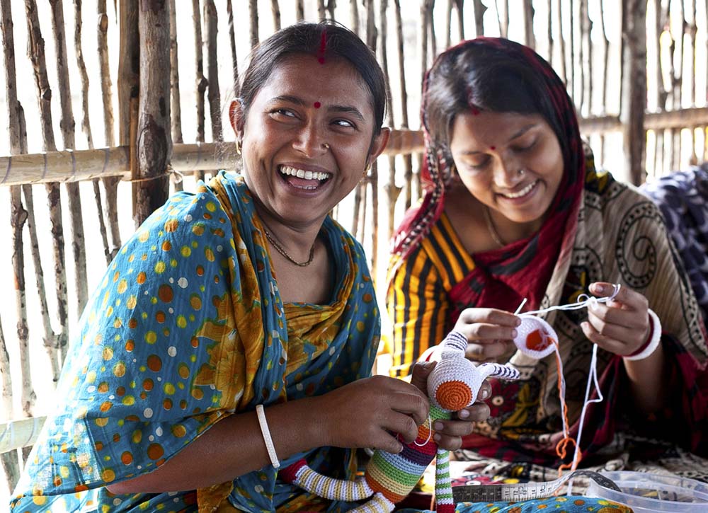 Two women in Bangladesh create handmade toys.