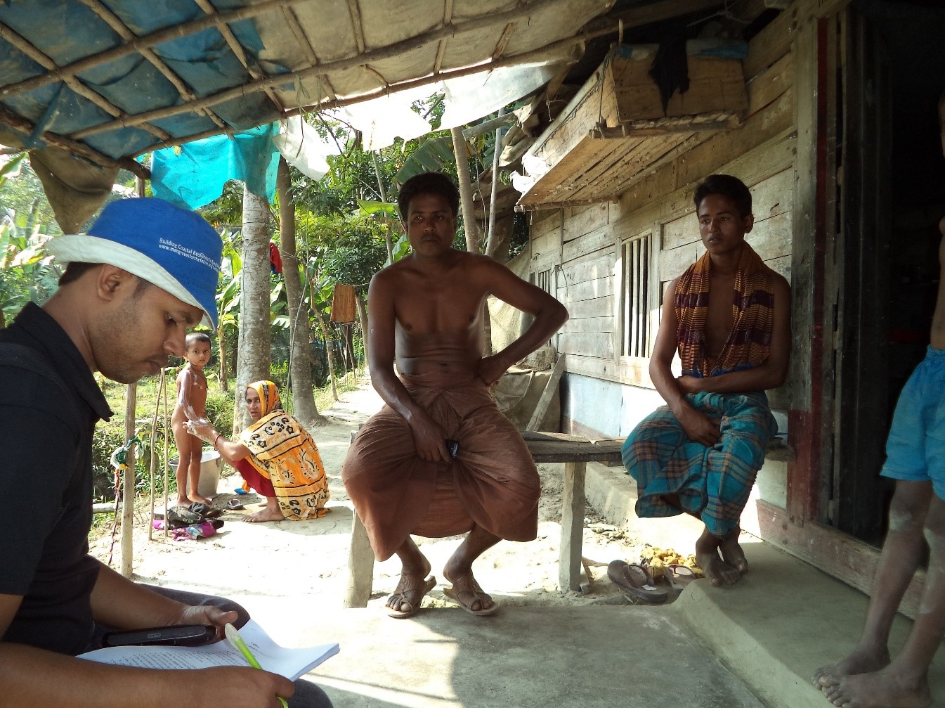 The CREL/JDR 3RD Mangrove Valuation team interviews residents of Sharankhola county, Khulna District, to understand how they use Sundarbans mangrove resources as part of their livelihoods